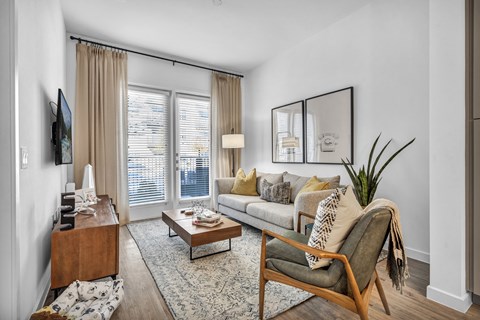 a living room with a couch and a coffee table